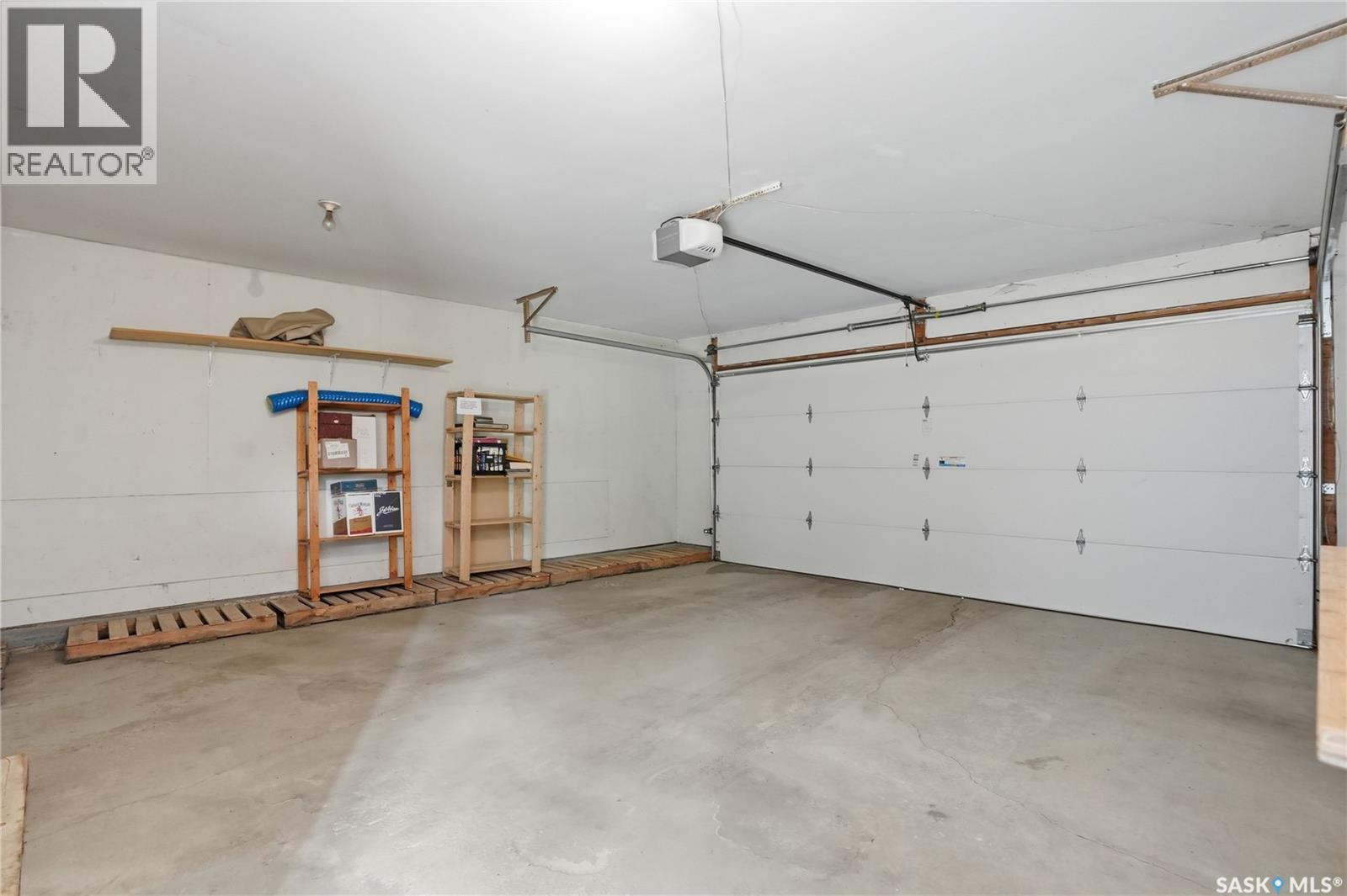 20 455 Pinehouse Drive, Saskatoon, SK - Indoor Photo Showing Garage
