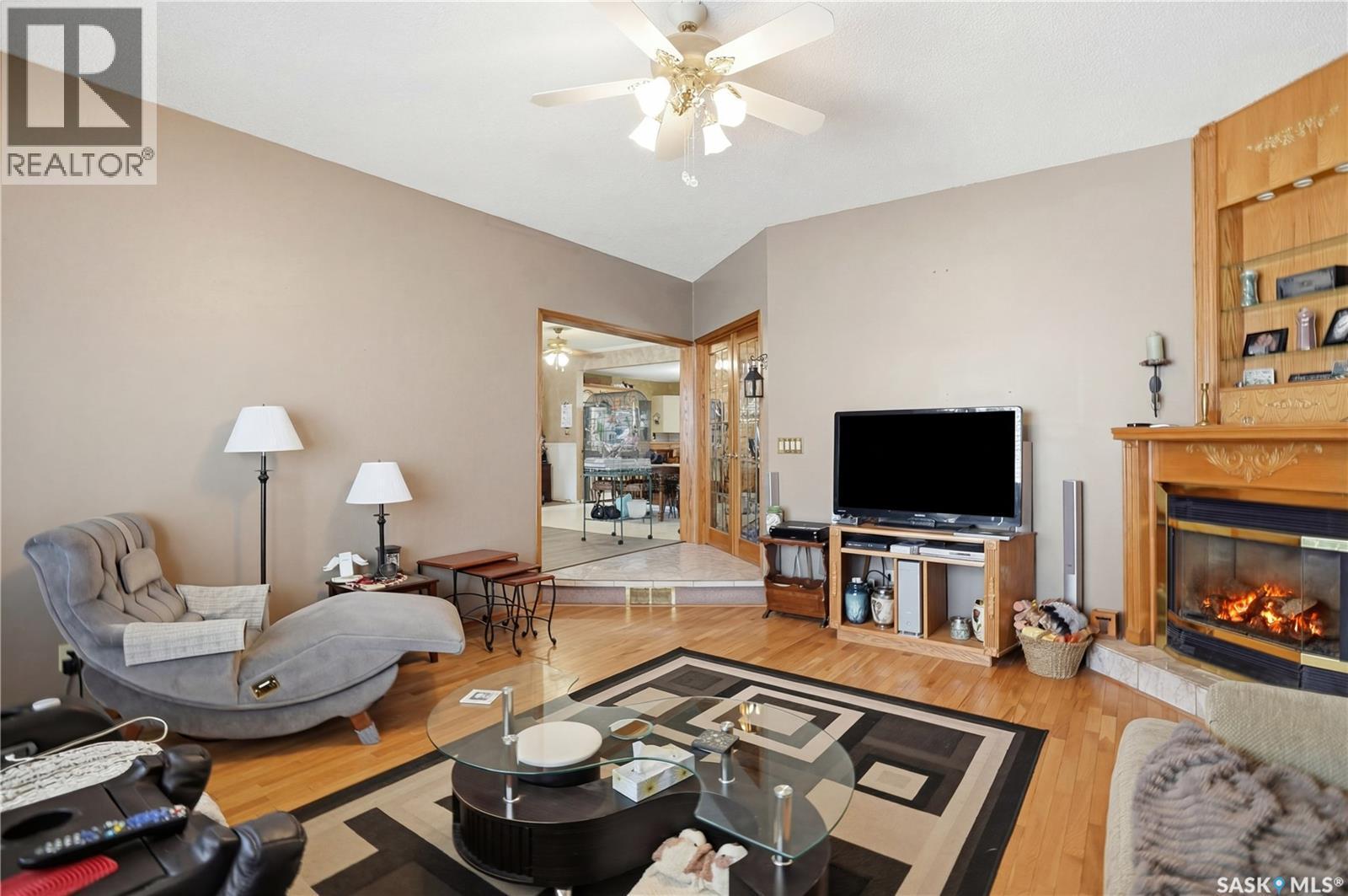 210 Railway Avenue, Mortlach, SK - Indoor Photo Showing Living Room With Fireplace