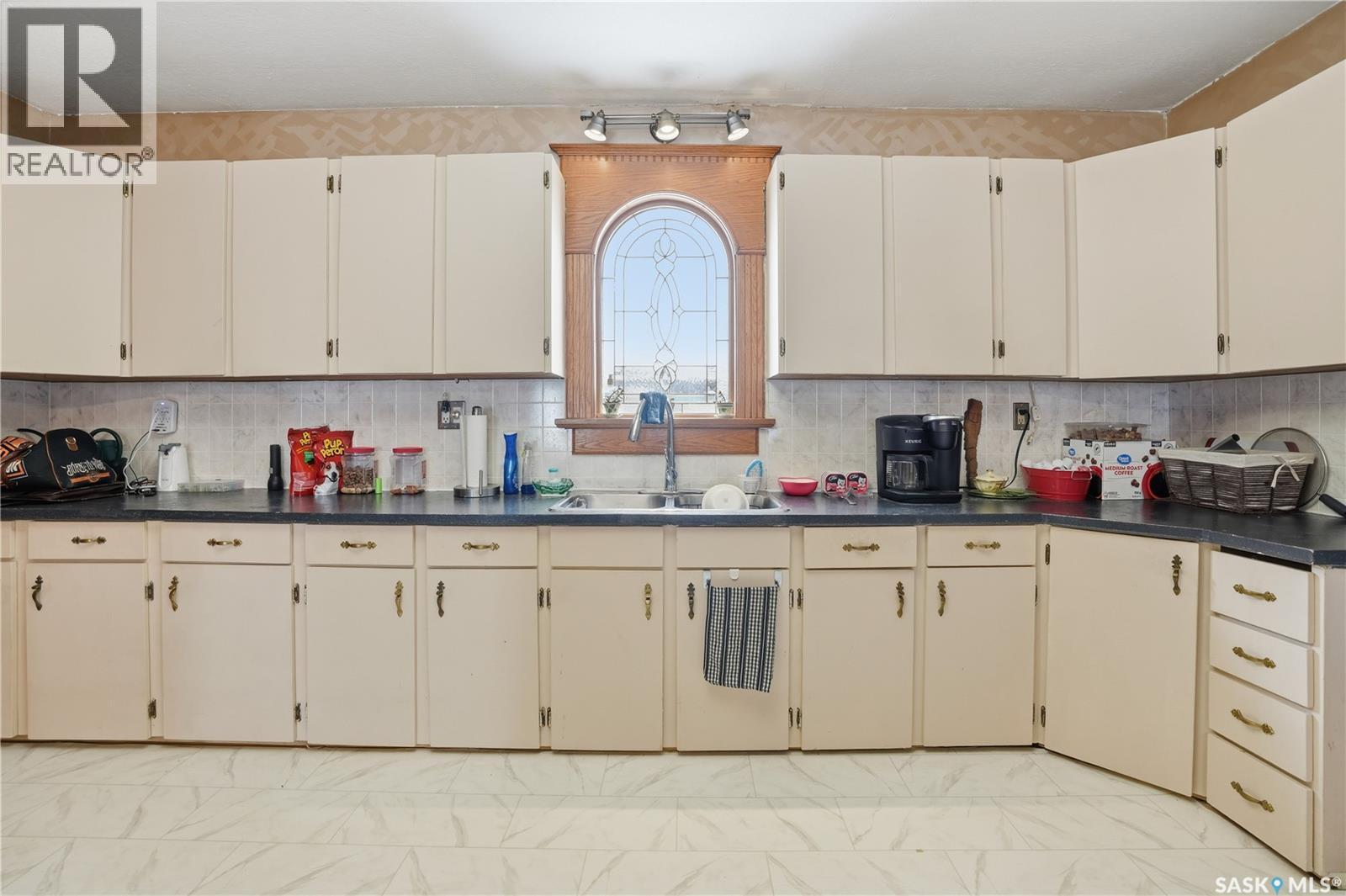 210 Railway Avenue, Mortlach, SK - Indoor Photo Showing Kitchen With Double Sink