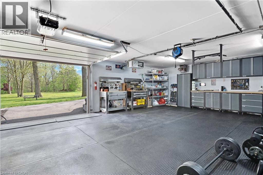 Opens to back of home - 1279 Maple Manor Road, Cambridge, ON - Indoor Photo Showing Garage