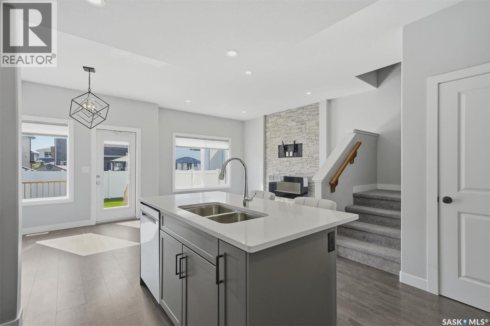 348 Brighton Gate, Saskatoon, SK - Indoor Photo Showing Kitchen With Double Sink