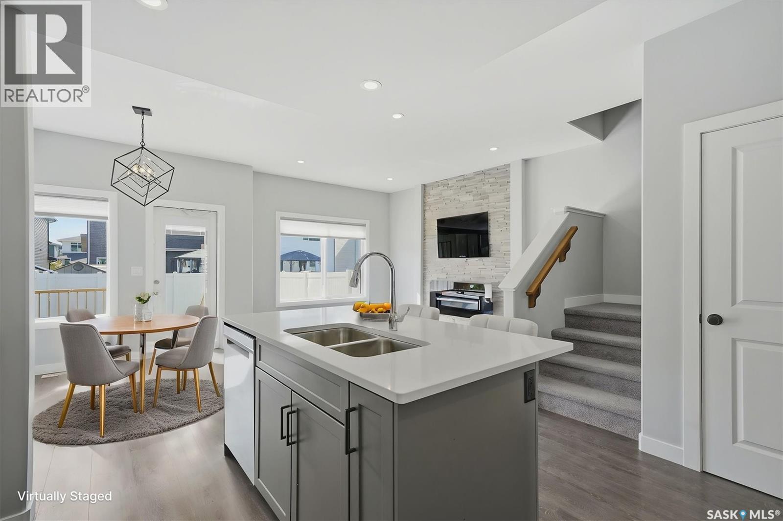 348 Brighton Gate, Saskatoon, SK - Indoor Photo Showing Kitchen With Double Sink