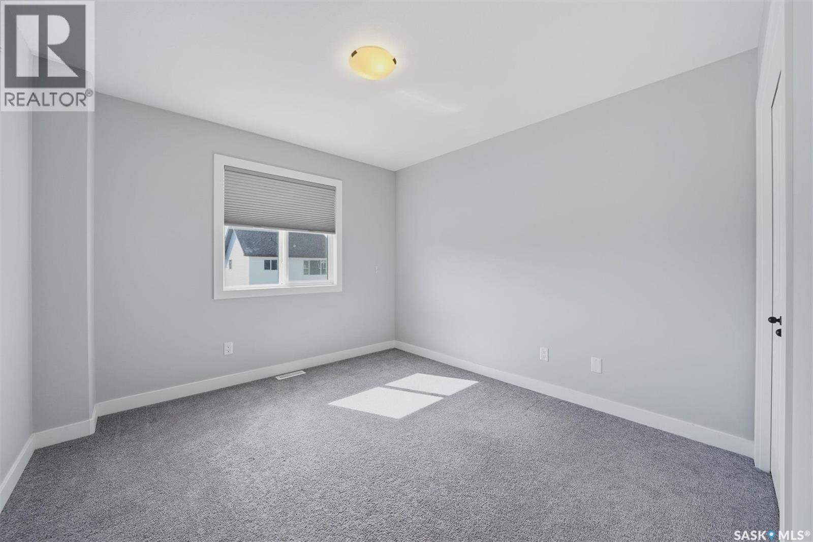 348 Brighton Gate, Saskatoon, SK - Indoor Photo Showing Other Room