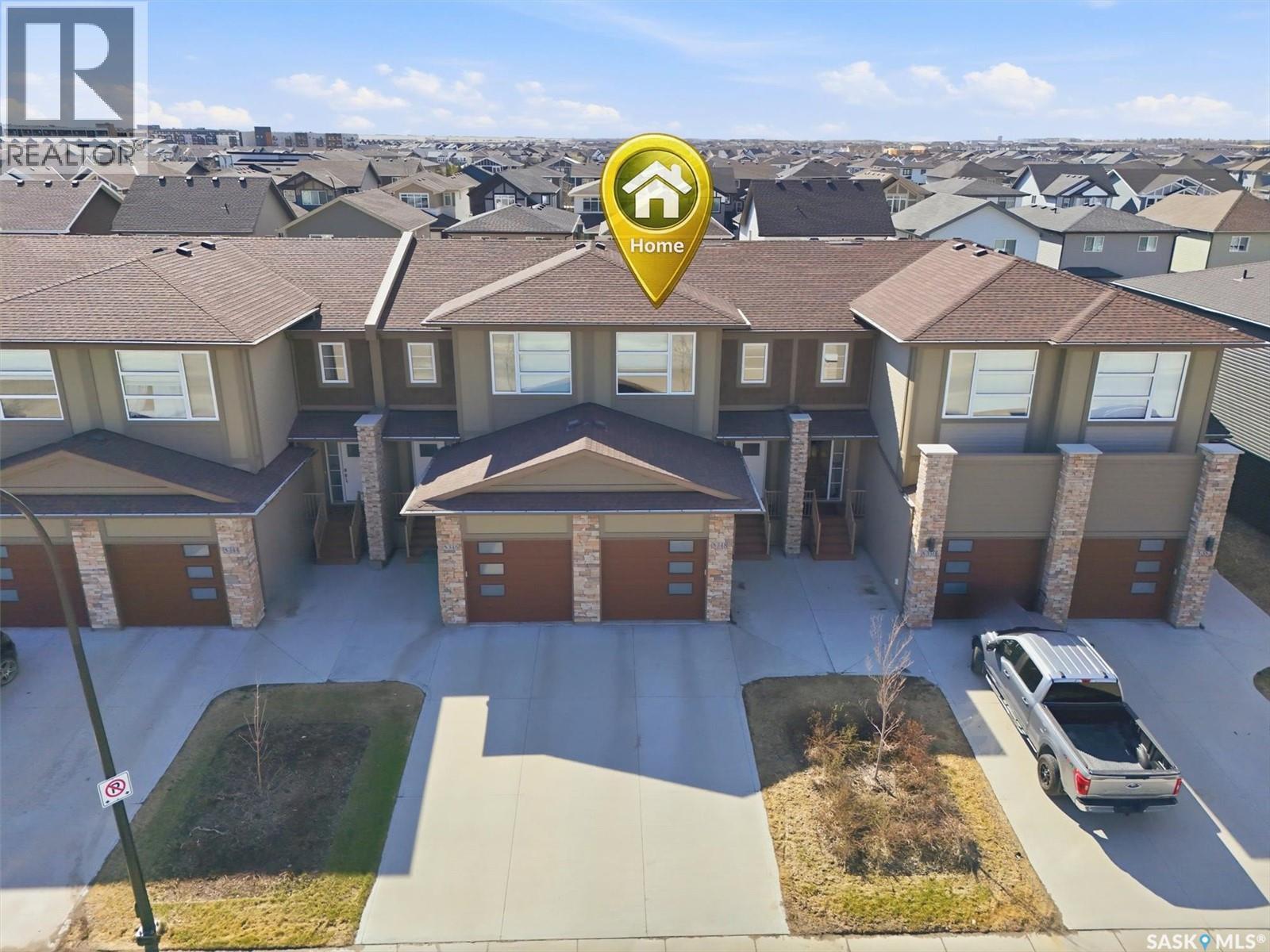 348 Brighton Gate, Saskatoon, SK - Outdoor With Facade