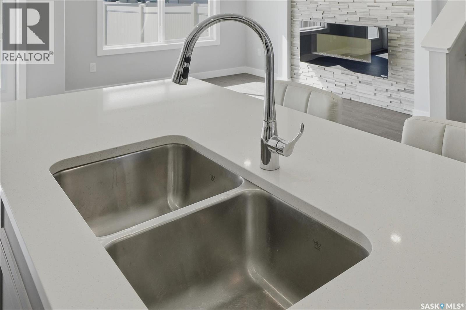 348 Brighton Gate, Saskatoon, SK - Indoor Photo Showing Kitchen With Double Sink