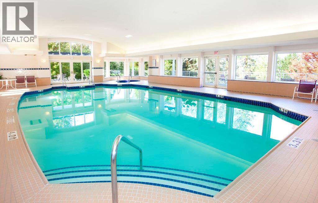 4520 Gallaghers Lookout Unit# 4, Kelowna, BC - Indoor Photo Showing Other Room With In Ground Pool