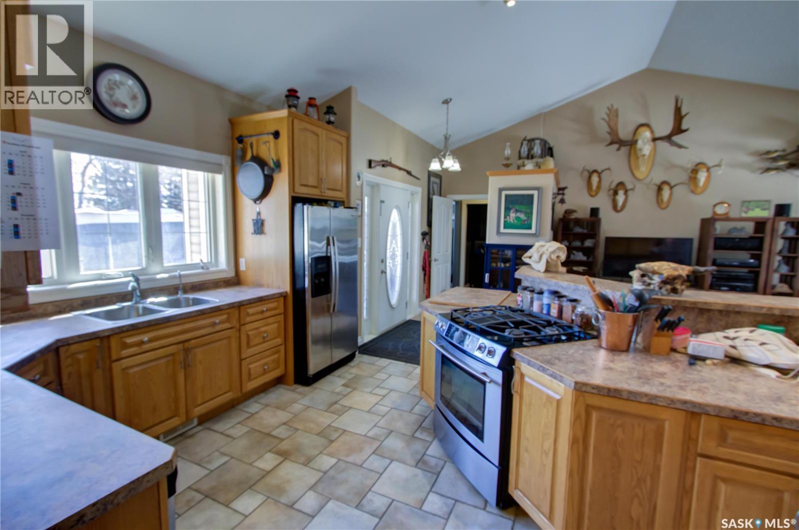 120 1St Avenue E, Love, SK - Indoor Photo Showing Kitchen With Double Sink