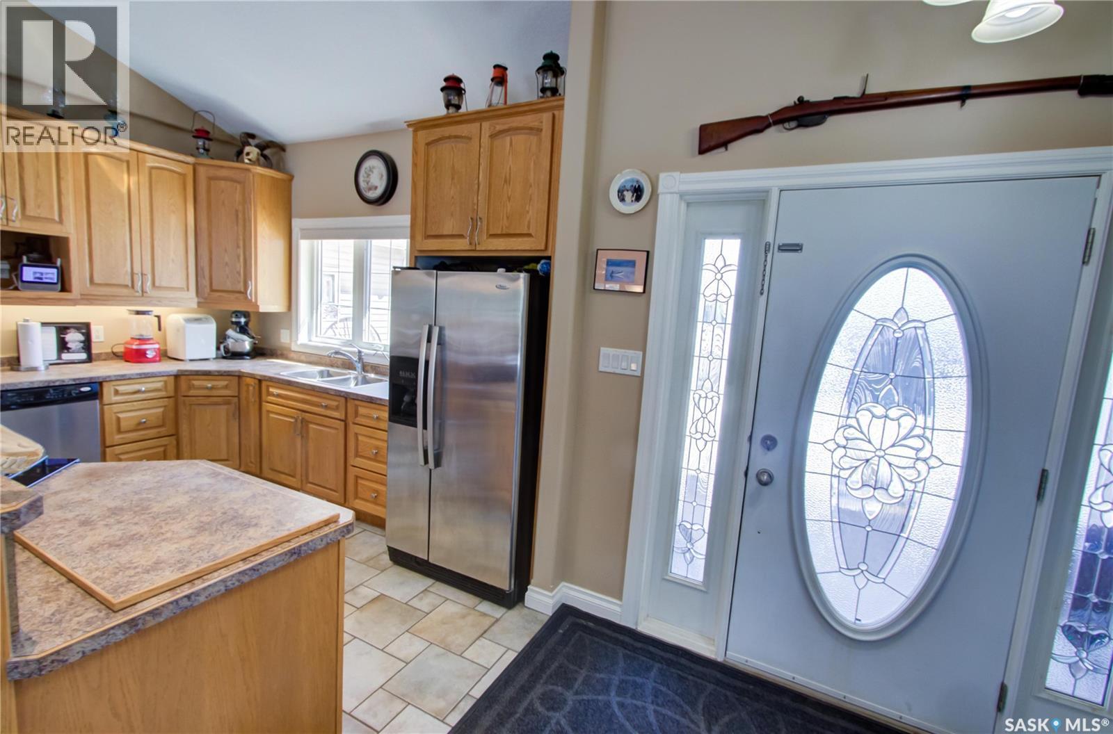 120 1St Avenue E, Love, SK - Indoor Photo Showing Kitchen With Double Sink