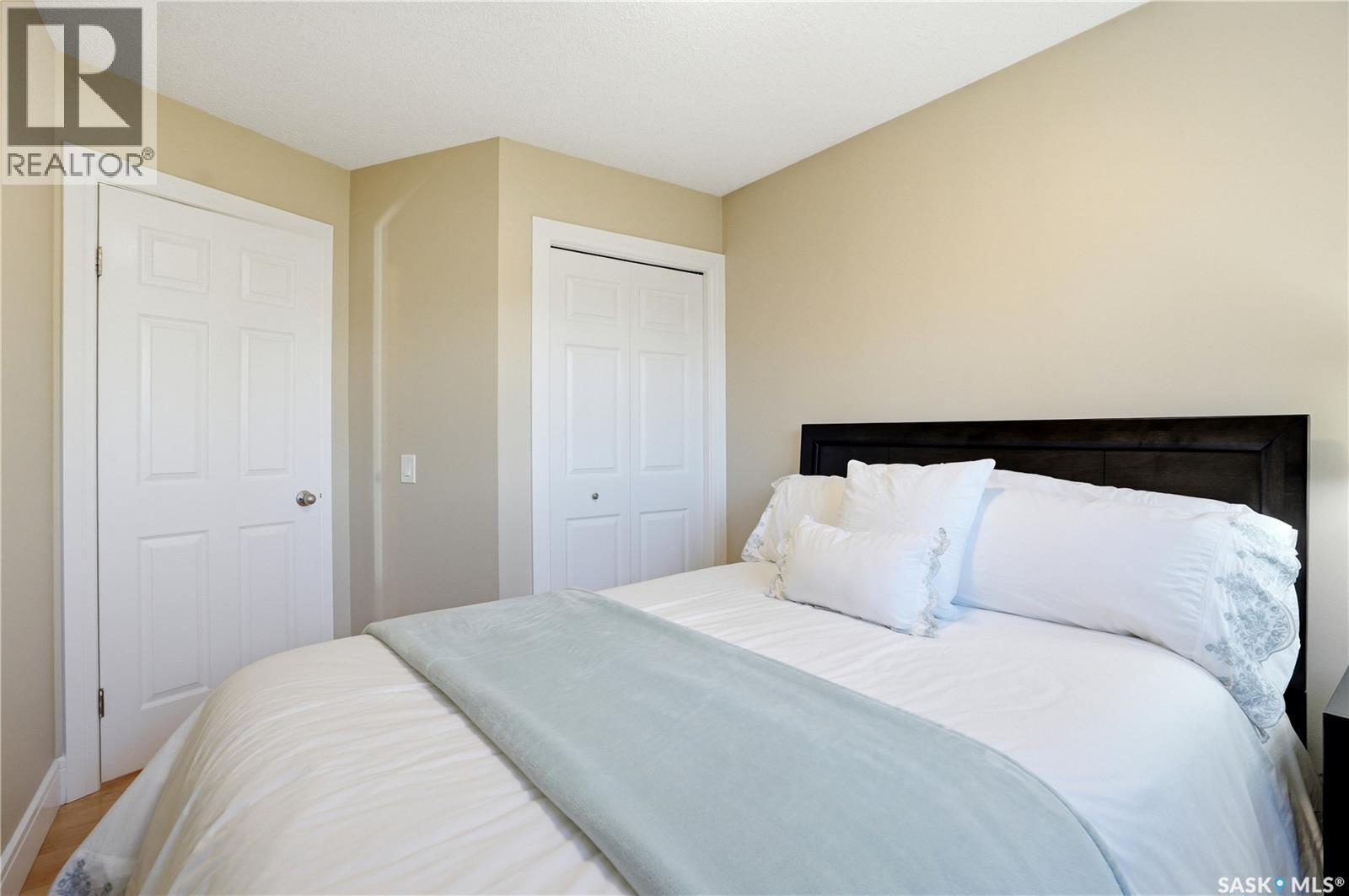 239 Scissons Court, Saskatoon, SK - Indoor Photo Showing Bedroom