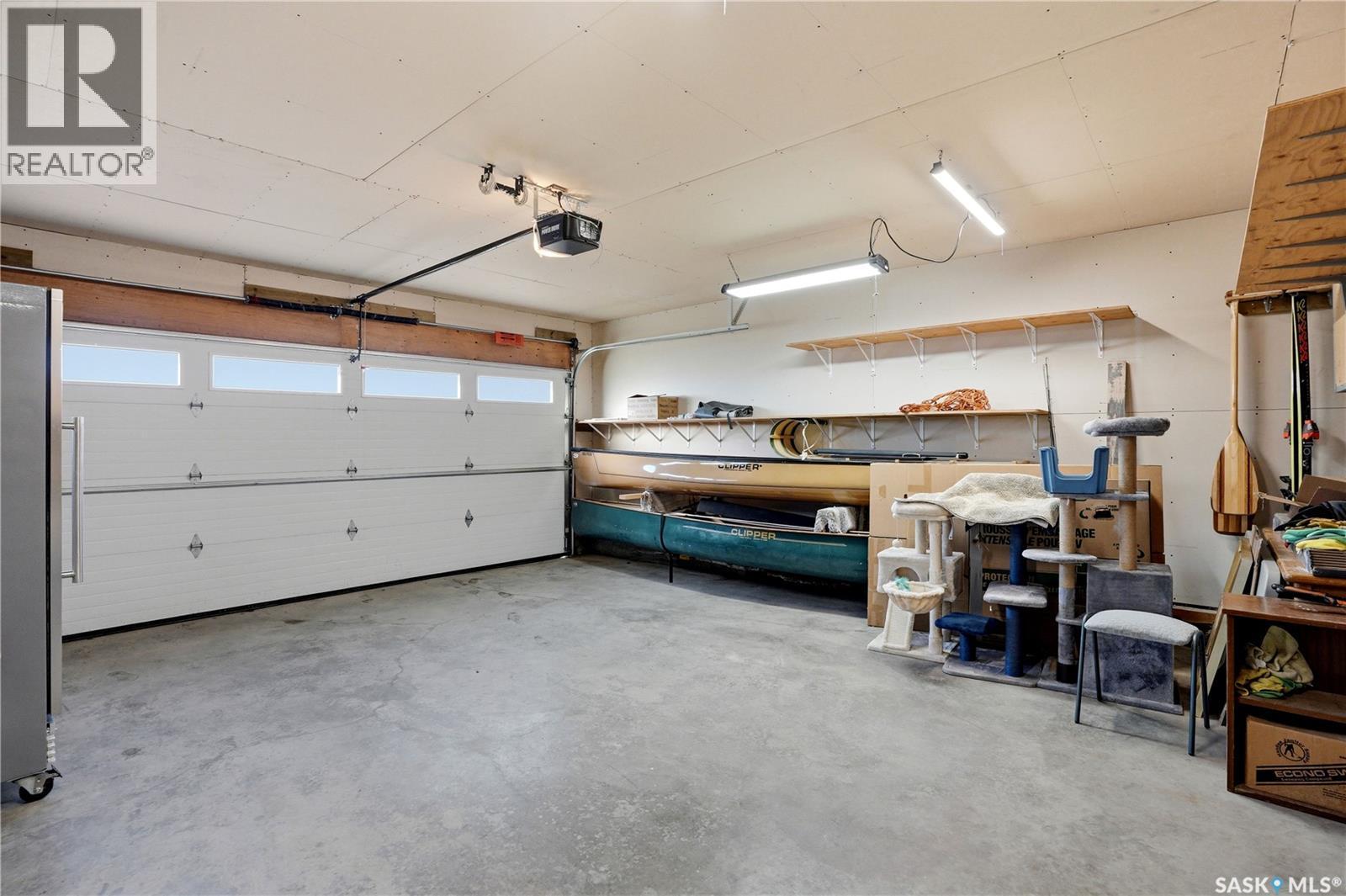 239 Scissons Court, Saskatoon, SK - Indoor Photo Showing Garage