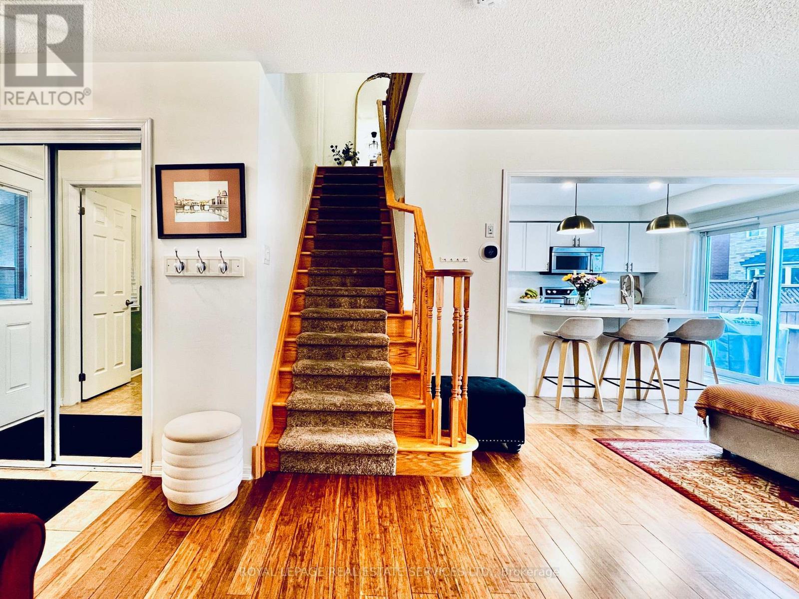 Oak Staircase with carpet runner - 906 Burrows Gate, Milton, ON - Indoor