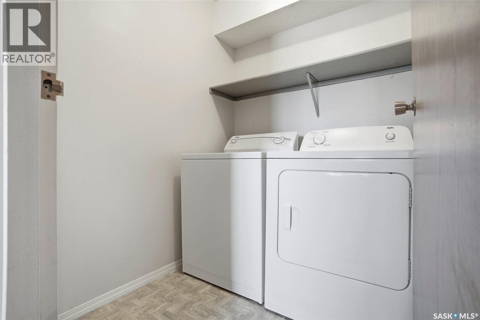 214 207C Tait Place, Saskatoon, SK - Indoor Photo Showing Laundry Room