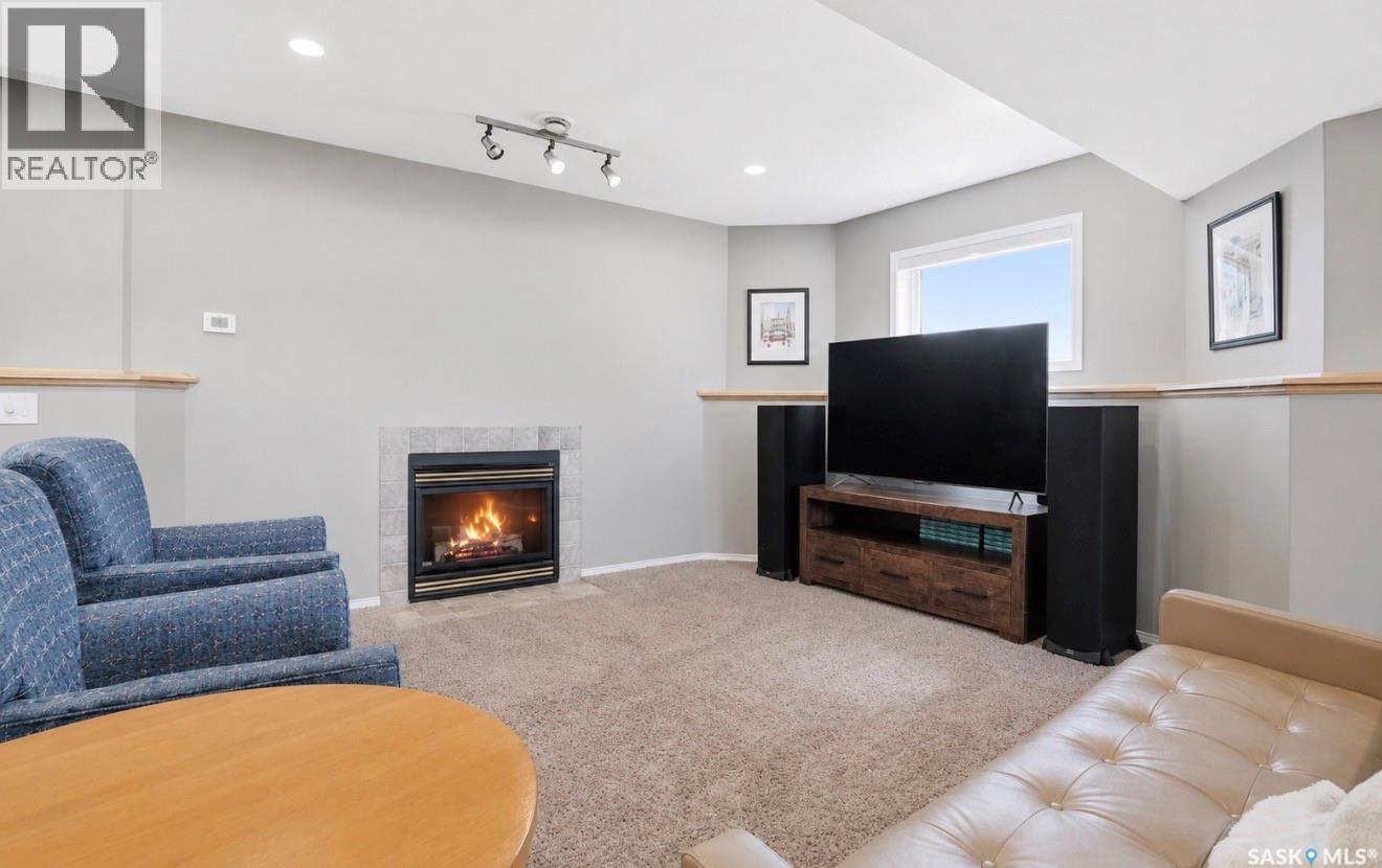 502 Le May Crescent, Saskatoon, SK - Indoor Photo Showing Living Room With Fireplace