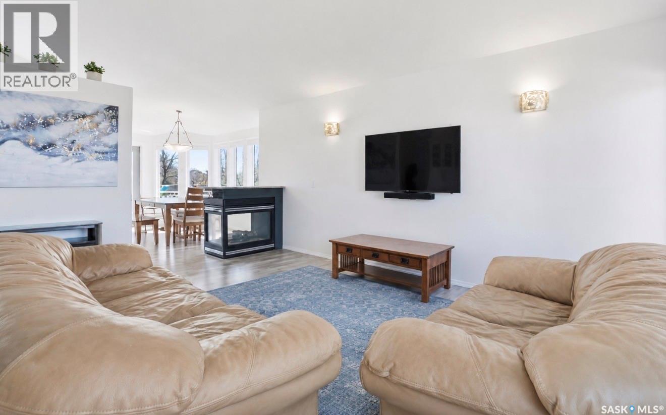 502 Le May Crescent, Saskatoon, SK - Indoor Photo Showing Living Room With Fireplace