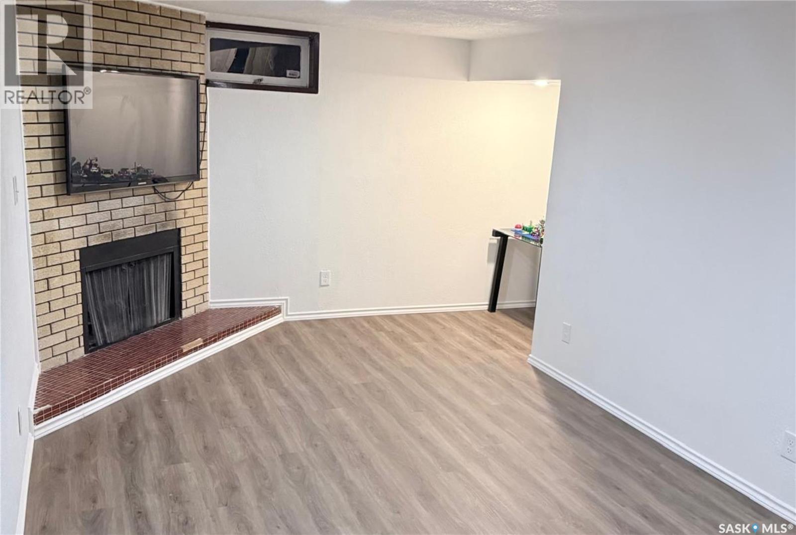 1341 9Th Avenue N, Regina, SK - Indoor With Fireplace