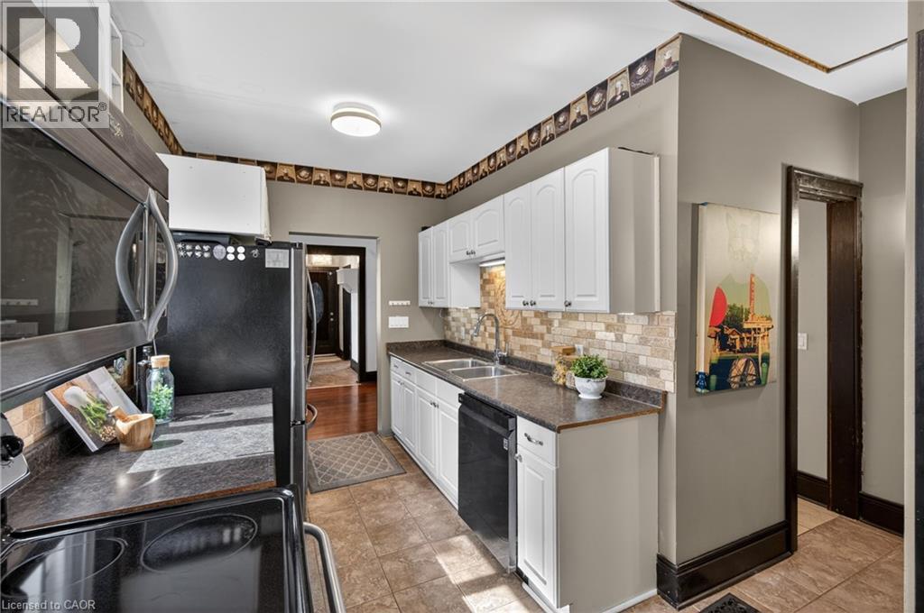 147 Strachan Street E, Hamilton, ON - Indoor Photo Showing Kitchen With Double Sink