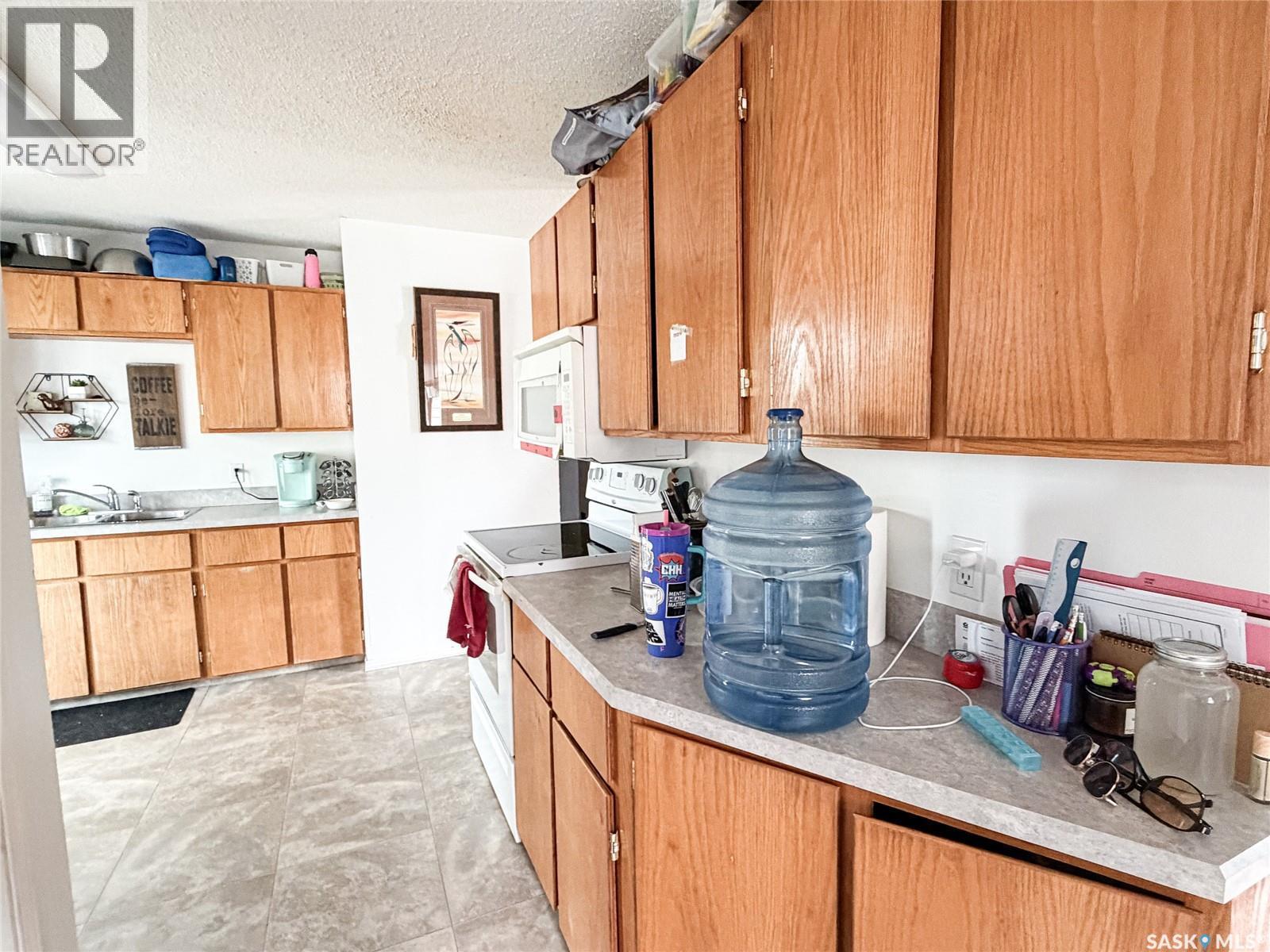 7 Dunfield Crescent, Meadow Lake, SK - Indoor Photo Showing Kitchen With Double Sink