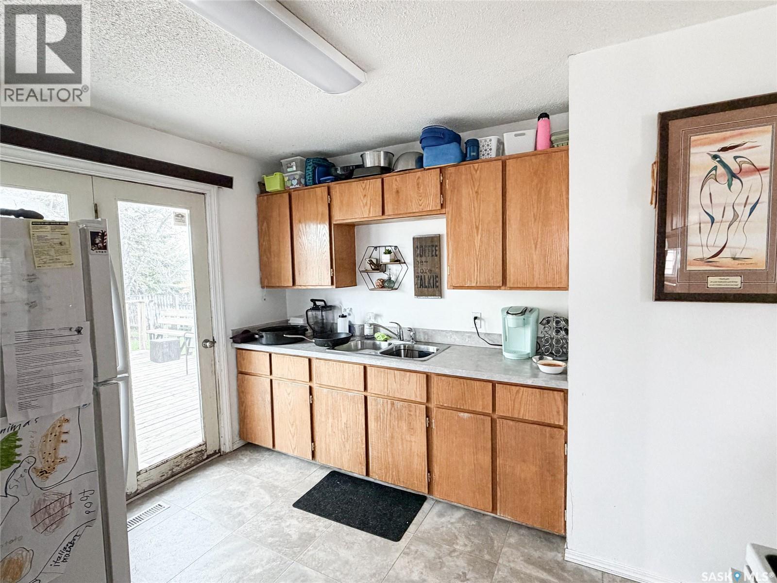7 Dunfield Crescent, Meadow Lake, SK - Indoor Photo Showing Kitchen With Double Sink