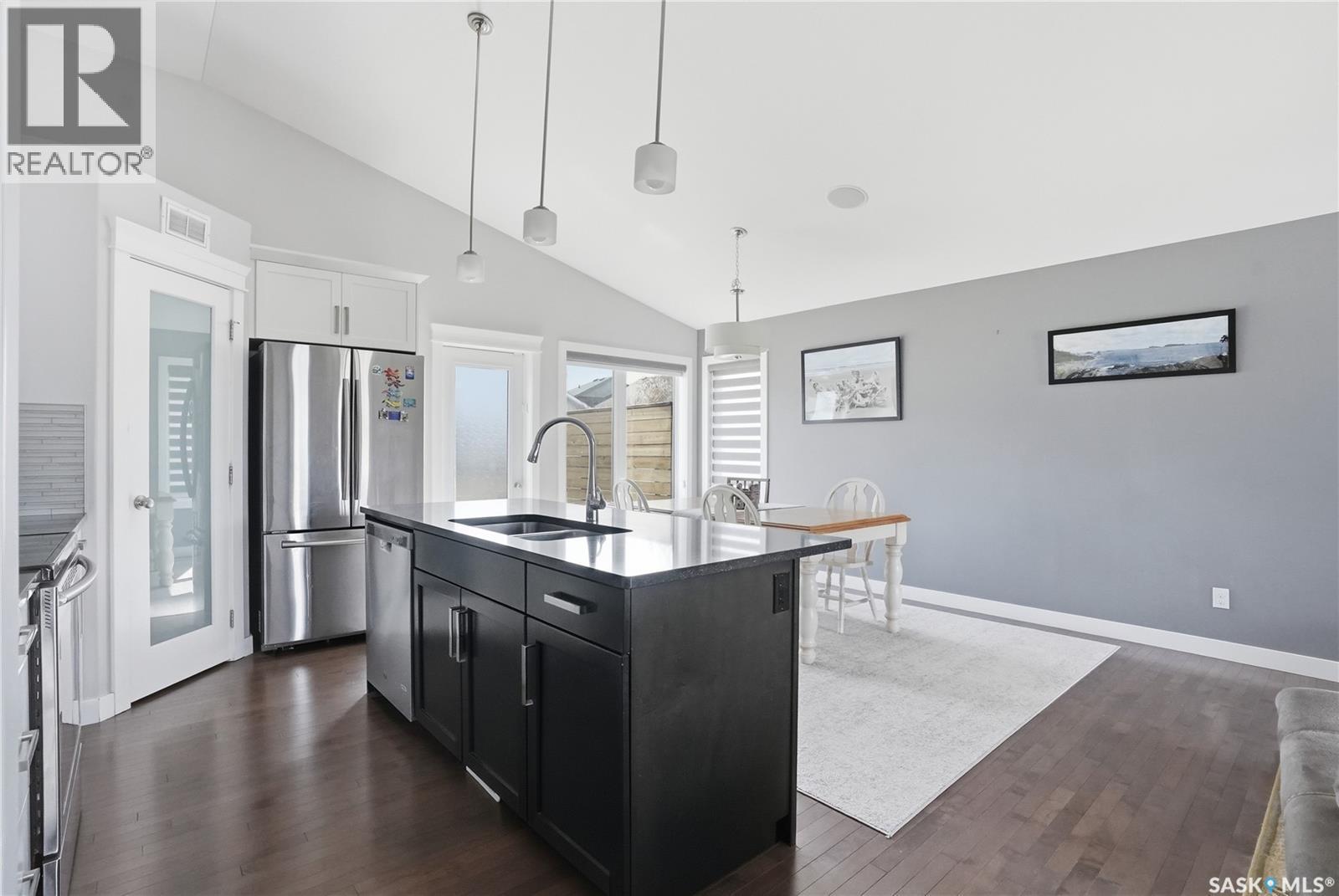 1111 Evergreen Boulevard, Saskatoon, SK - Indoor Photo Showing Kitchen With Stainless Steel Kitchen With Double Sink With Upgraded Kitchen