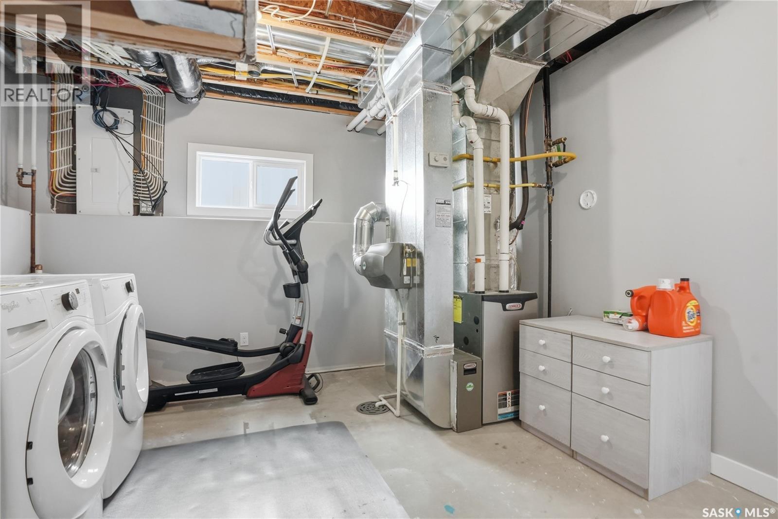 1111 Evergreen Boulevard, Saskatoon, SK - Indoor Photo Showing Laundry Room