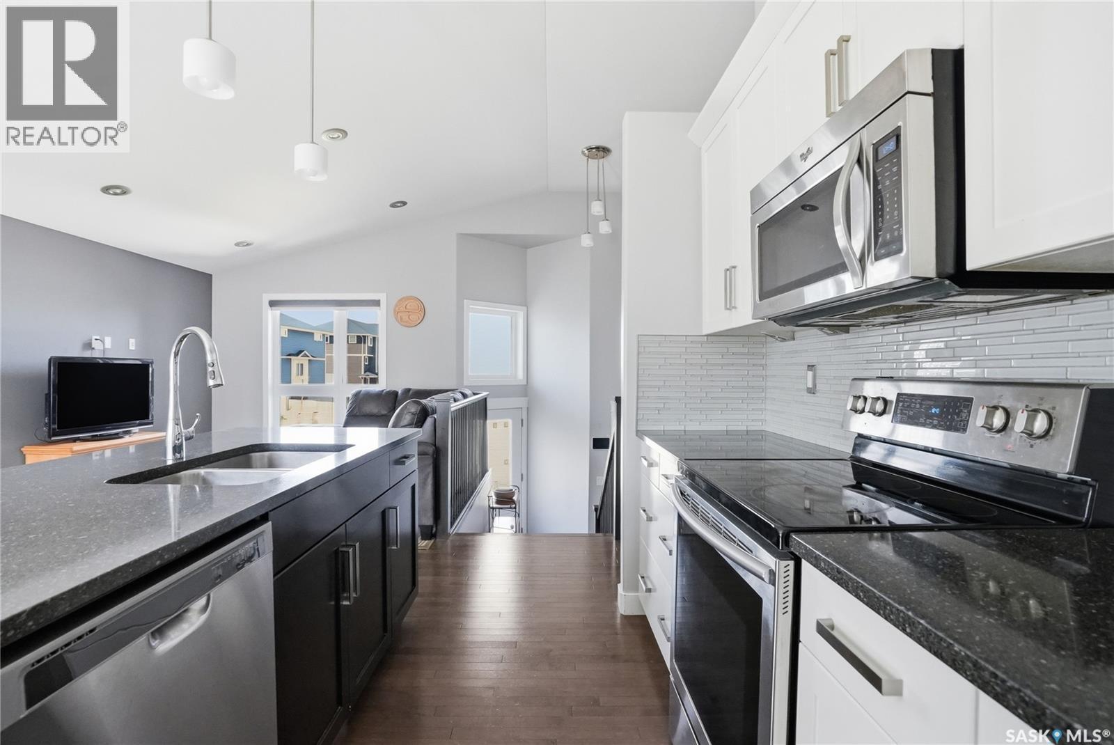 1111 Evergreen Boulevard, Saskatoon, SK - Indoor Photo Showing Kitchen With Stainless Steel Kitchen With Double Sink With Upgraded Kitchen