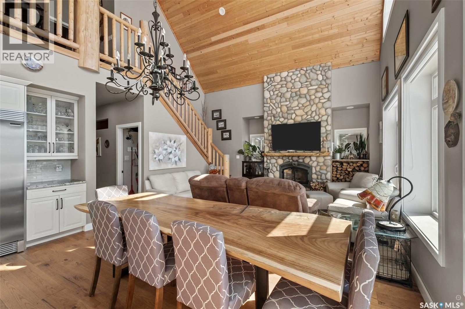 3 Wayne Place, Candle Lake, SK - Indoor Photo Showing Dining Room With Fireplace