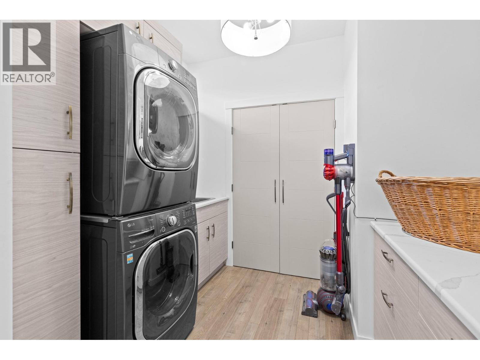 Laundry Covered deck - Main floor. - 647 Mt Ida Drive, Coldstream, BC