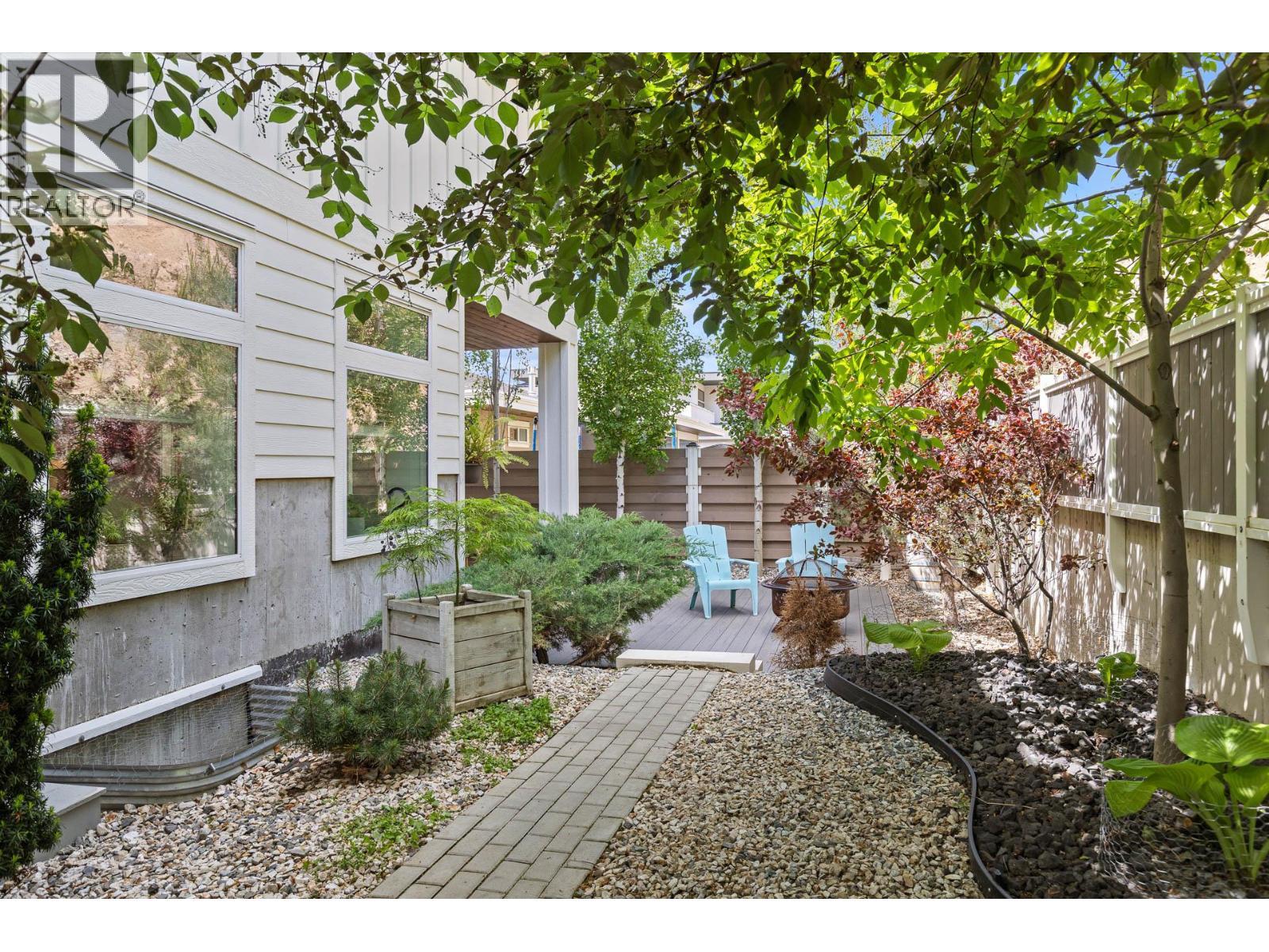 Main home access backyard. - 647 Mt Ida Drive, Coldstream, BC