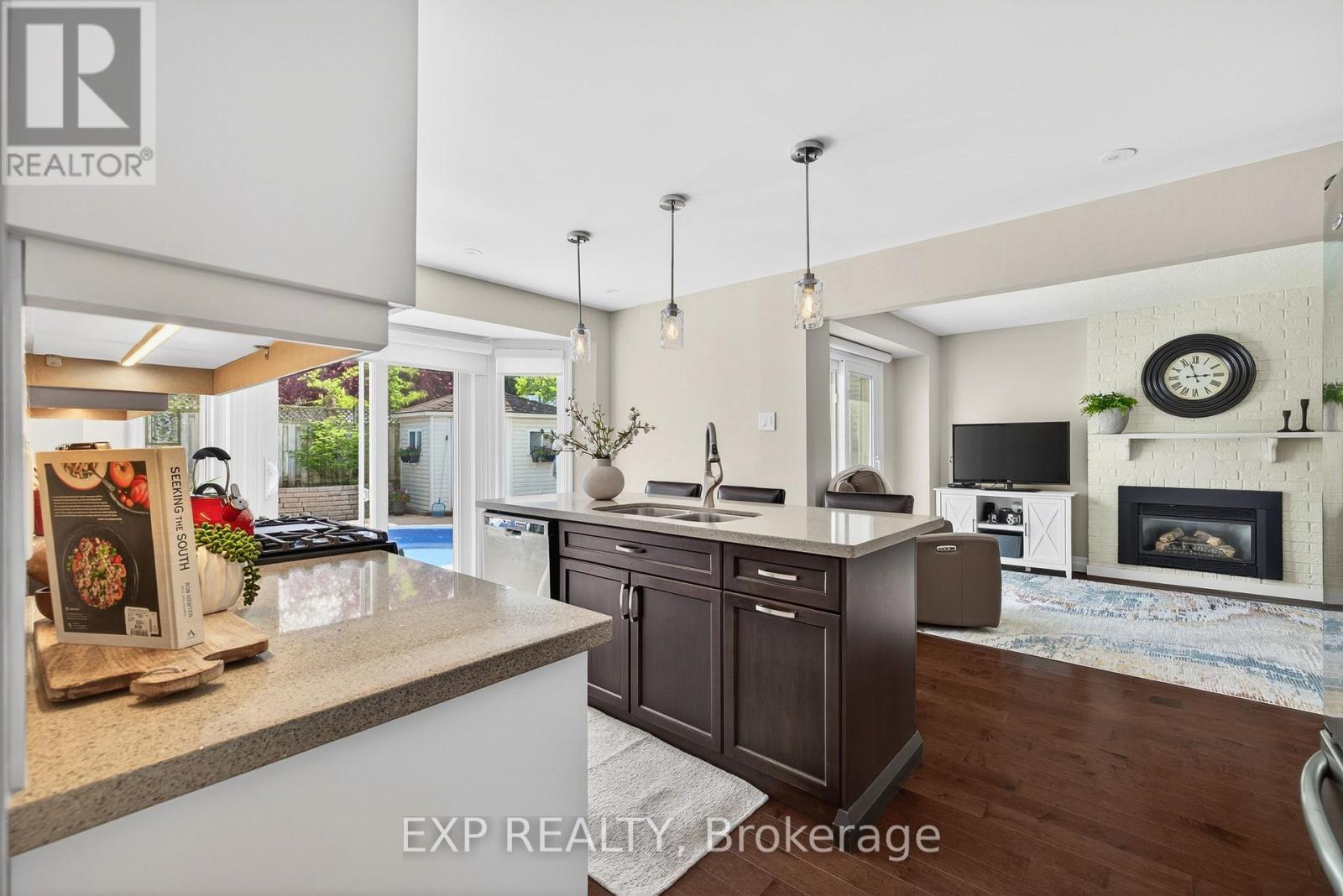 108 Old Forest Crescent, Kitchener, ON - Indoor Photo Showing Kitchen With Fireplace With Double Sink