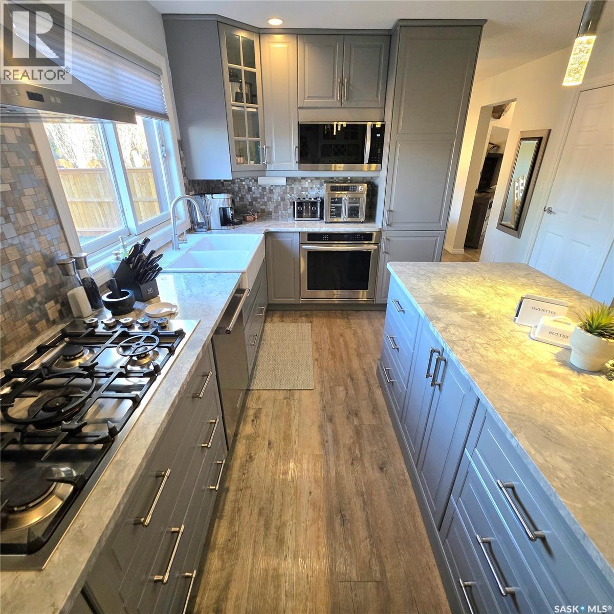868 Conroy Place, Prince Albert, SK - Indoor Photo Showing Kitchen With Double Sink