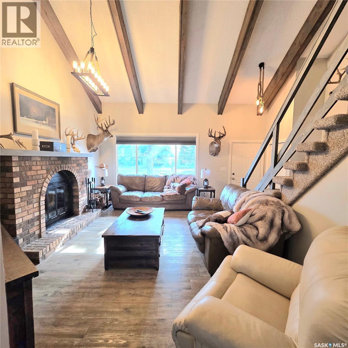 868 Conroy Place, Prince Albert, SK - Indoor Photo Showing Living Room With Fireplace