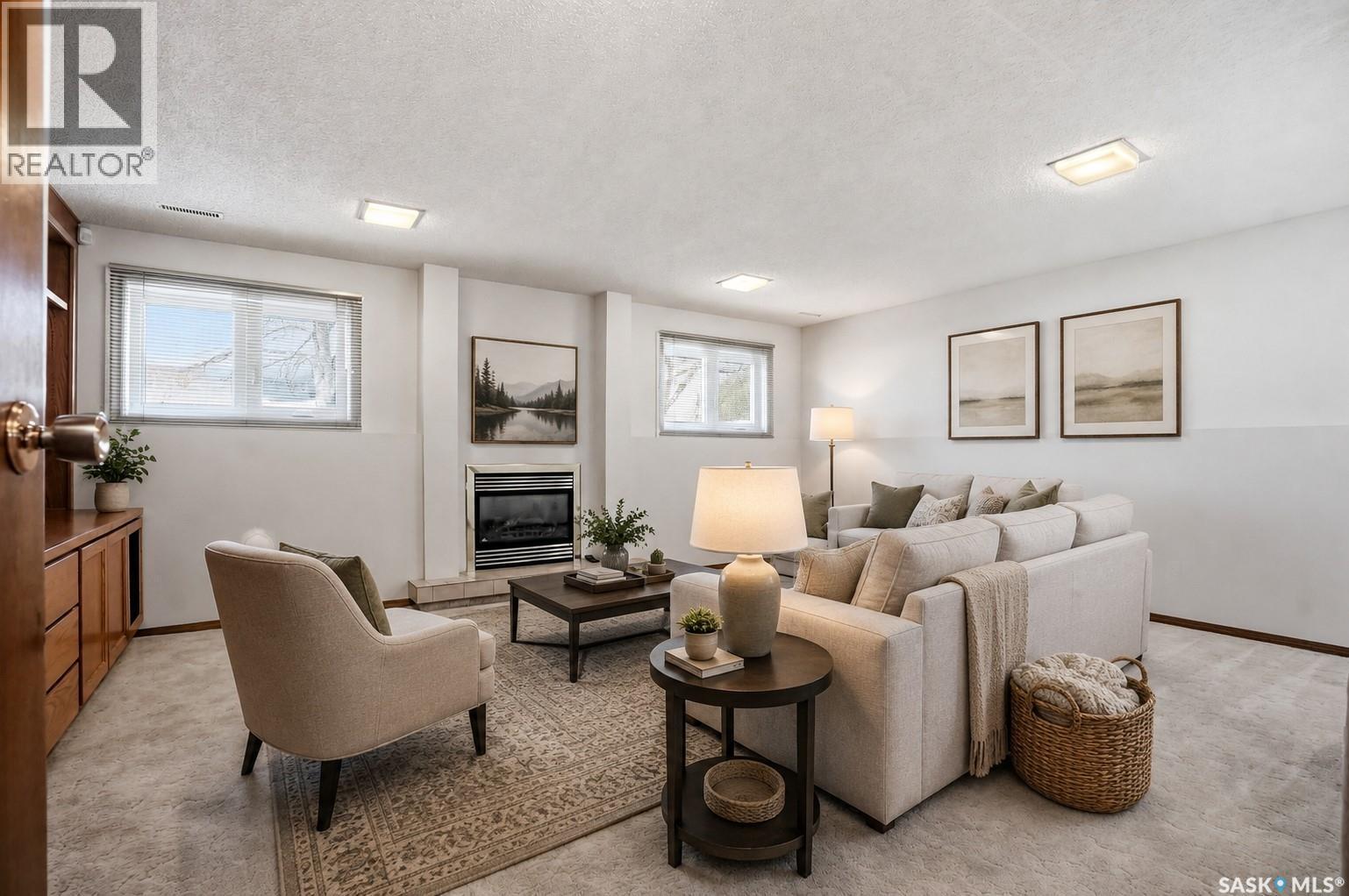 227 Flavelle Crescent, Saskatoon, SK - Indoor Photo Showing Living Room With Fireplace