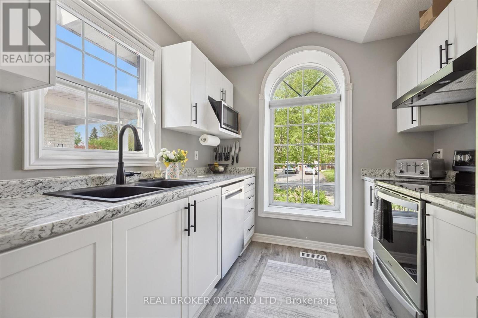 Galley Kitchen - 511 Dansbury Drive, Waterloo, ON - Indoor Photo Showing Kitchen With Double Sink With Upgraded Kitchen