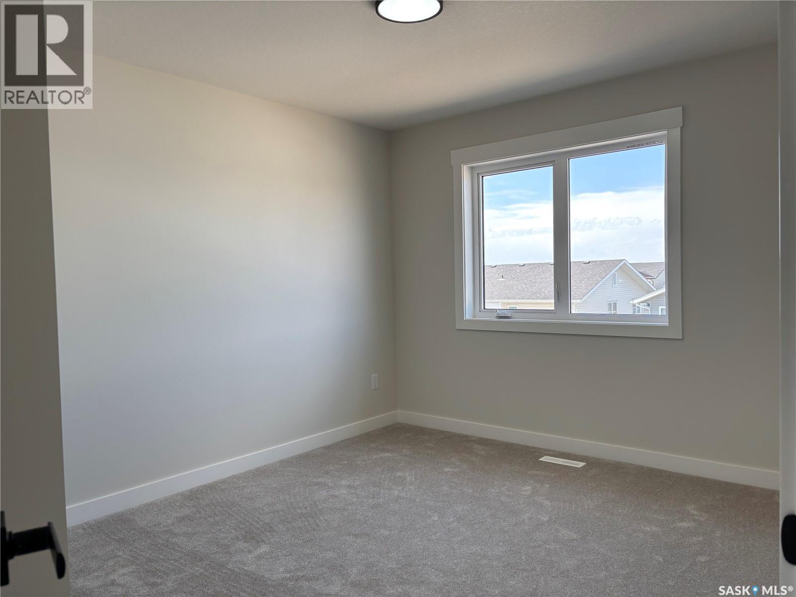 222 Veterans Drive, Warman, SK - Indoor Photo Showing Other Room