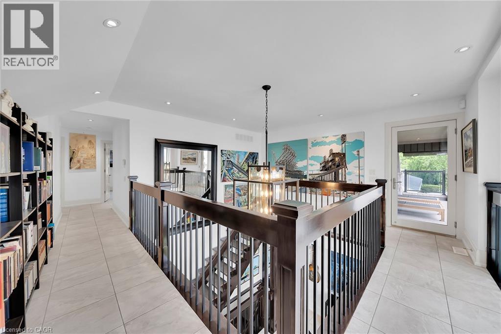Hall featuring light tile patterned floors, recessed lighting, and a chandelier - 404 Mountain Brow Boulevard E, Hamilton, ON - Indoor Photo Showing Other Room