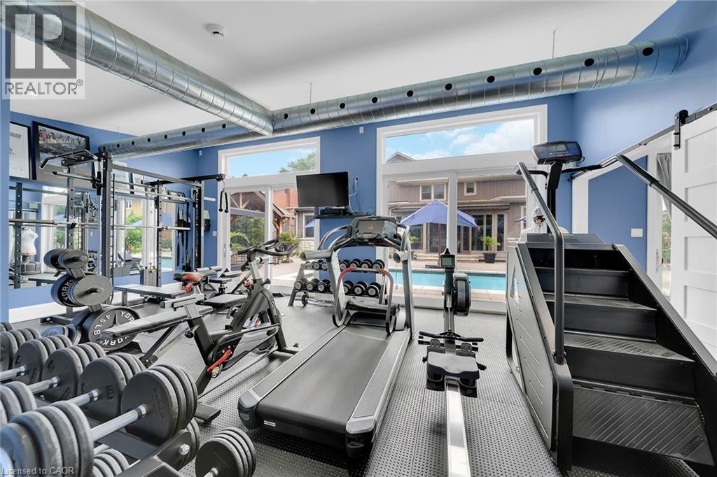 Exercise room with a barn door - 404 Mountain Brow Boulevard E, Hamilton, ON - Indoor Photo Showing Gym Room