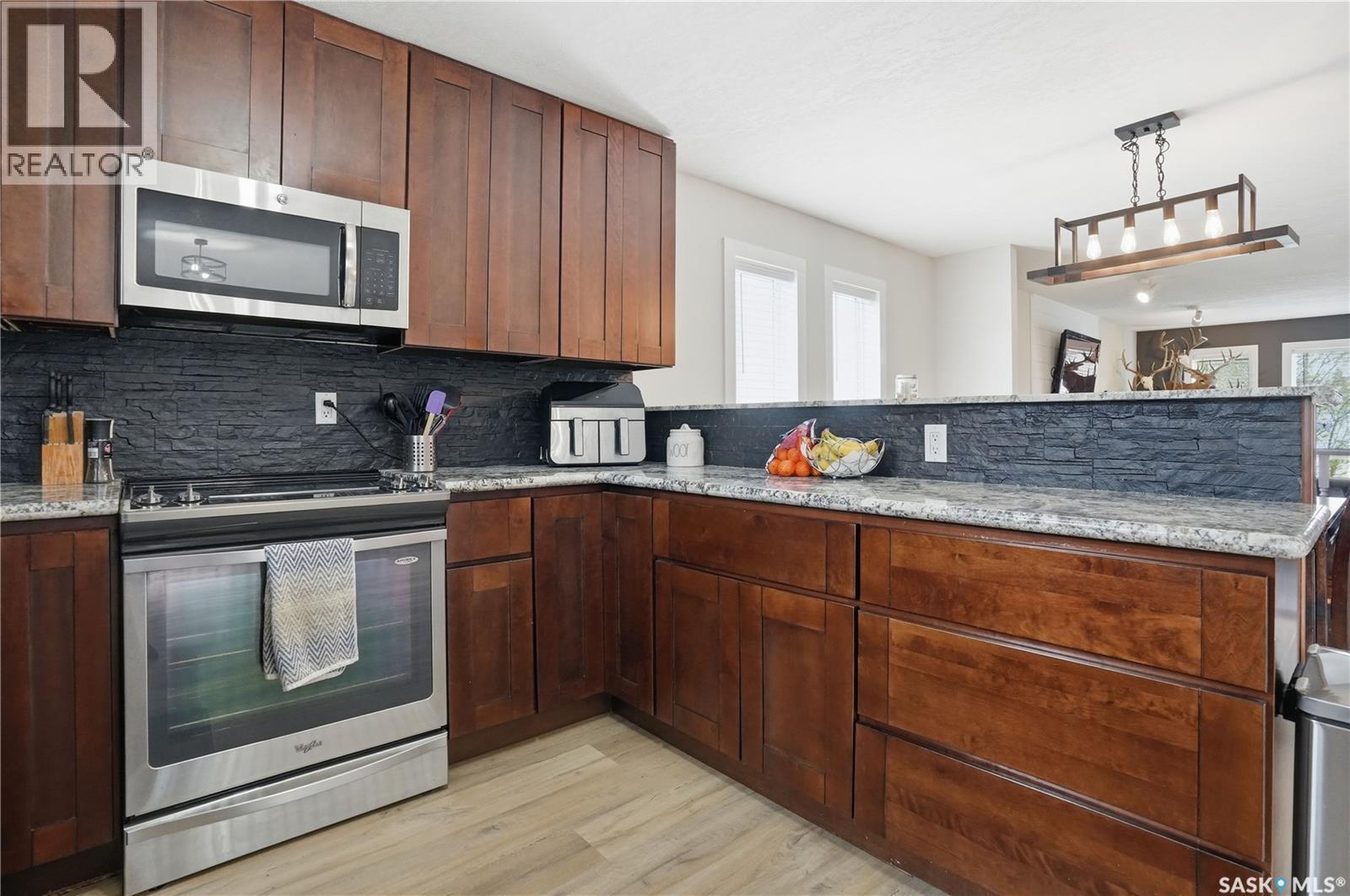 165 3Rd Street, Pilot Butte, SK - Indoor Photo Showing Kitchen With Stainless Steel Kitchen With Upgraded Kitchen