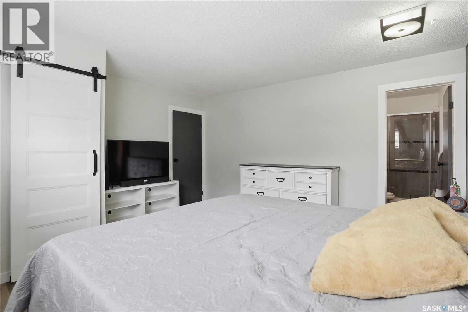 165 3Rd Street, Pilot Butte, SK - Indoor Photo Showing Bedroom