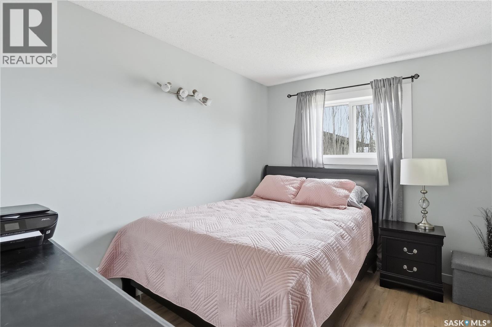 165 3Rd Street, Pilot Butte, SK - Indoor Photo Showing Bedroom