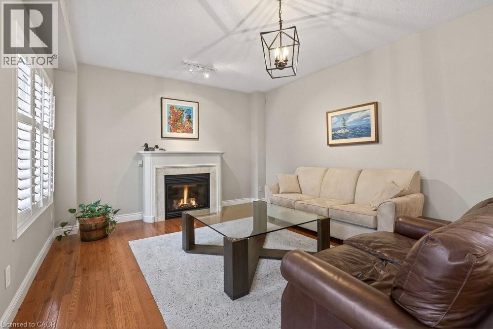 100 Beddoe Drive Unit# 101, Hamilton, ON - Indoor Photo Showing Living Room With Fireplace