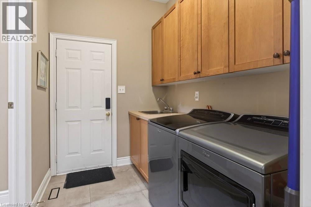 Laundry on main w/ garage entry - 100 Beddoe Drive Unit# 101, Hamilton, ON - Indoor Photo Showing Laundry Room
