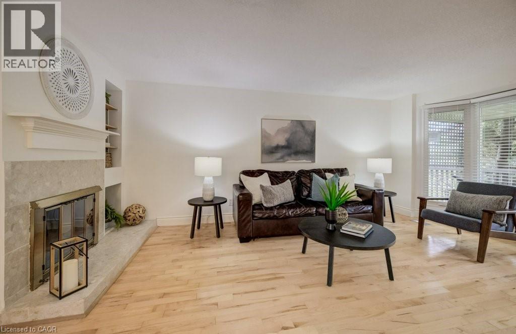 106 Parkland Crescent, Kitchener, ON - Indoor Photo Showing Living Room With Fireplace