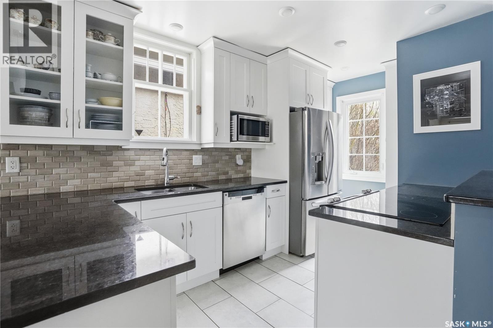 3625 Victoria Avenue, Regina, SK - Indoor Photo Showing Kitchen With Double Sink