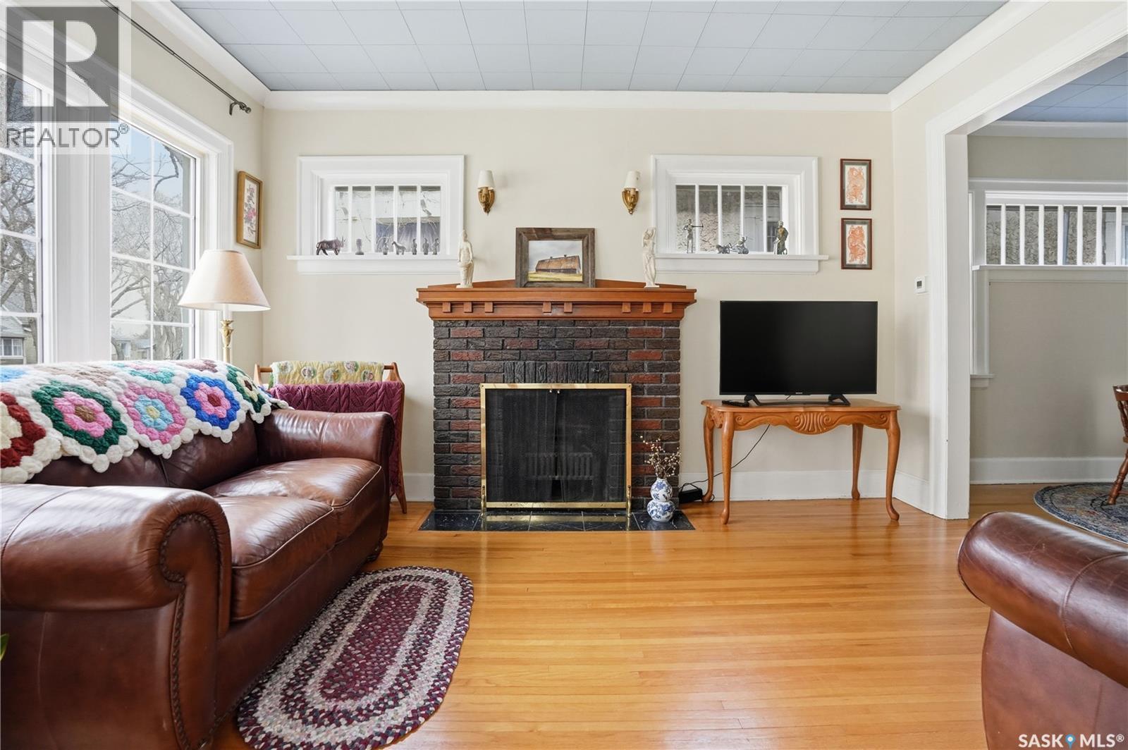3625 Victoria Avenue, Regina, SK - Indoor Photo Showing Living Room With Fireplace