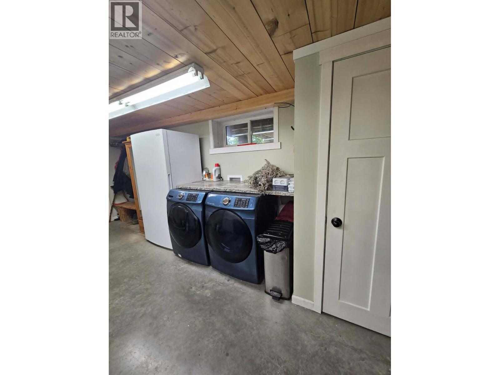 laundry and storage - 270 Brash-Allen Road, Enderby, BC - Indoor Photo Showing Laundry Room