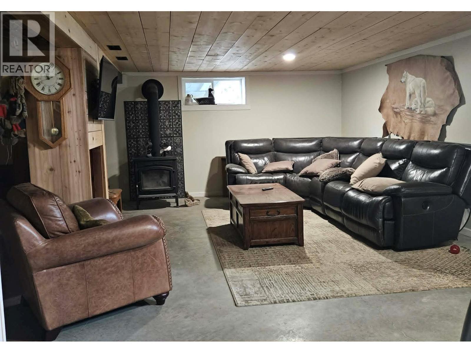recreation room - 270 Brash-Allen Road, Enderby, BC - Indoor Photo Showing Basement With Fireplace