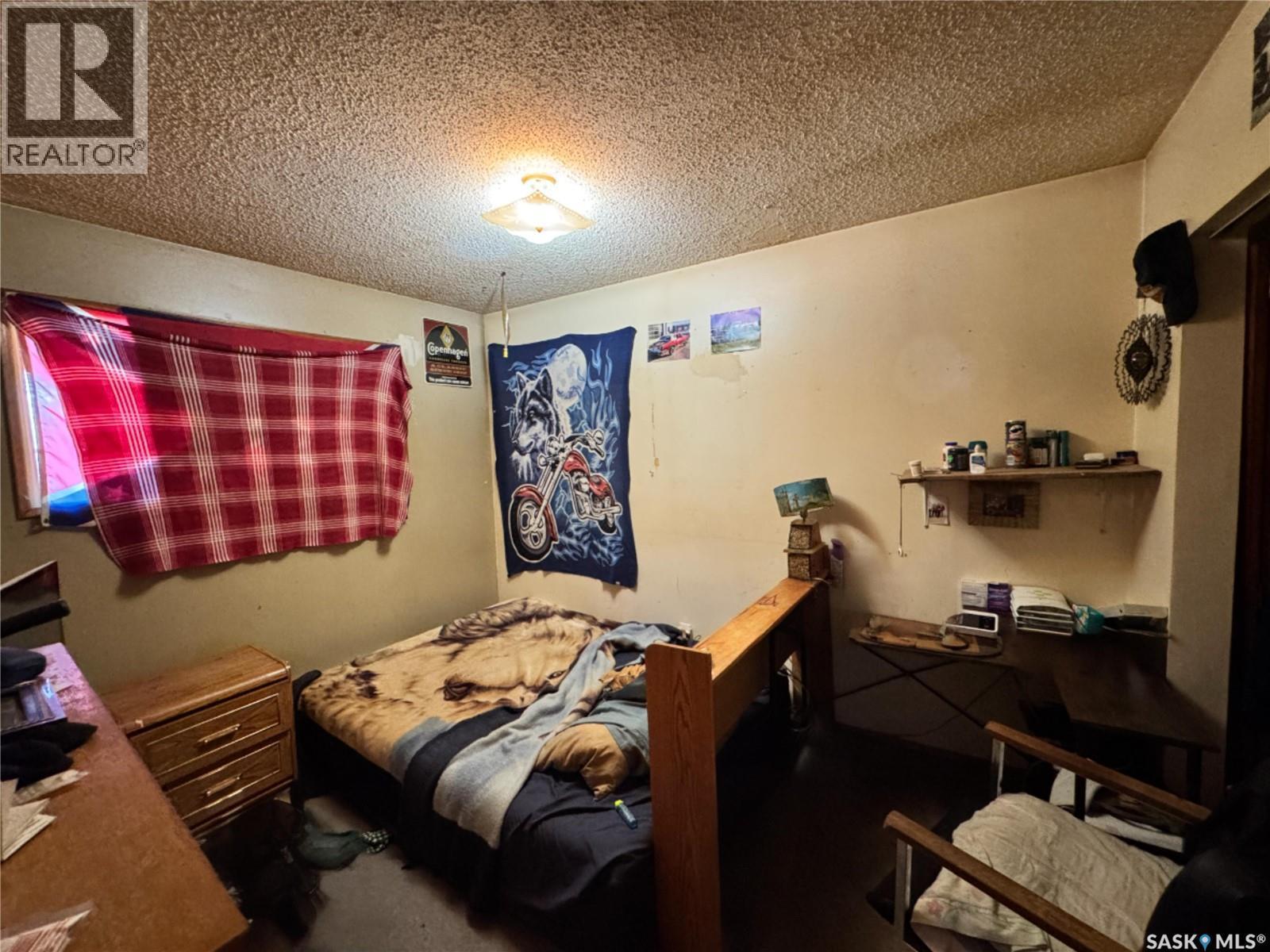 102 1St Avenue, Landis, SK - Indoor Photo Showing Bedroom