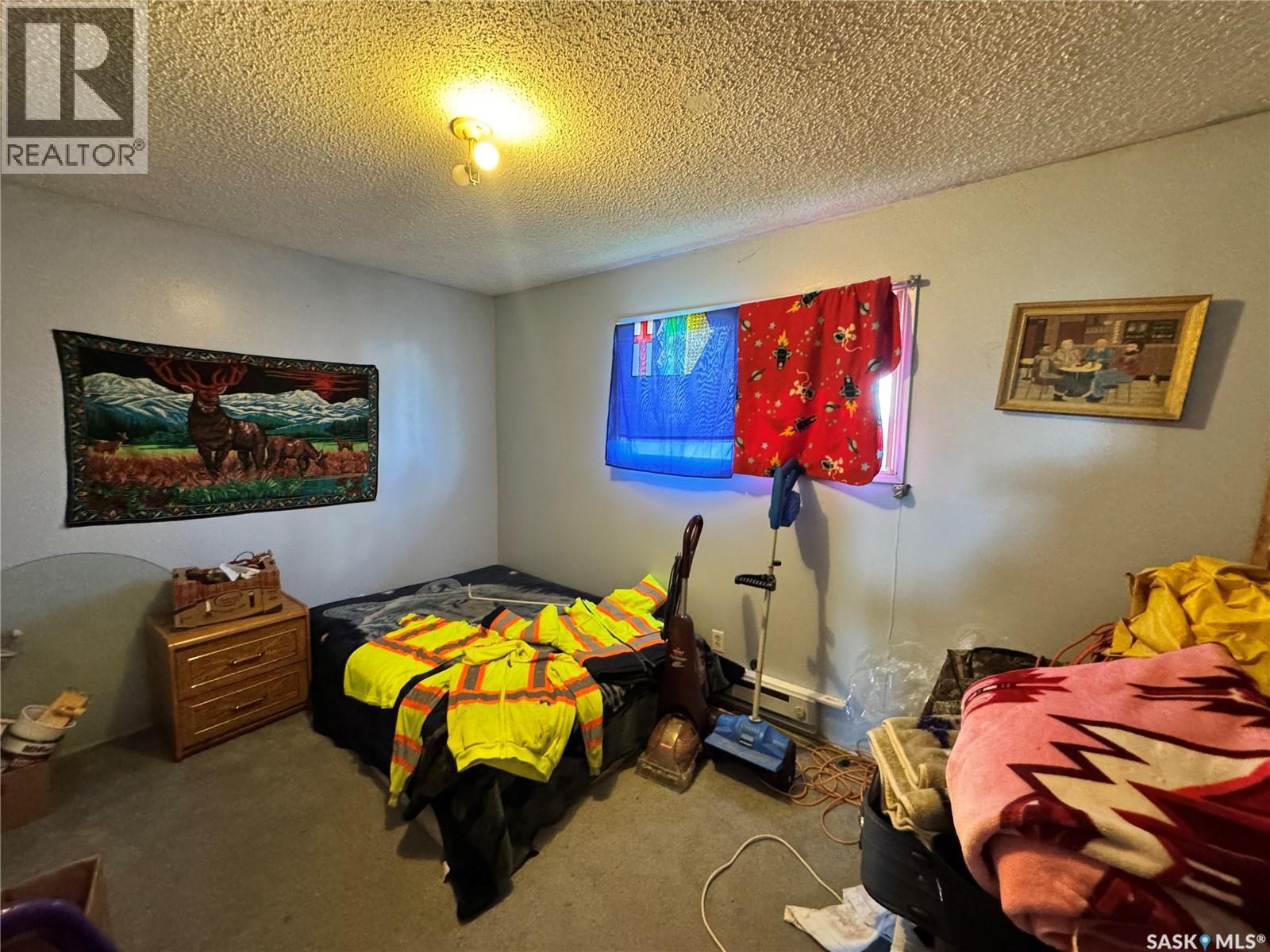 102 1St Avenue, Landis, SK - Indoor Photo Showing Bedroom