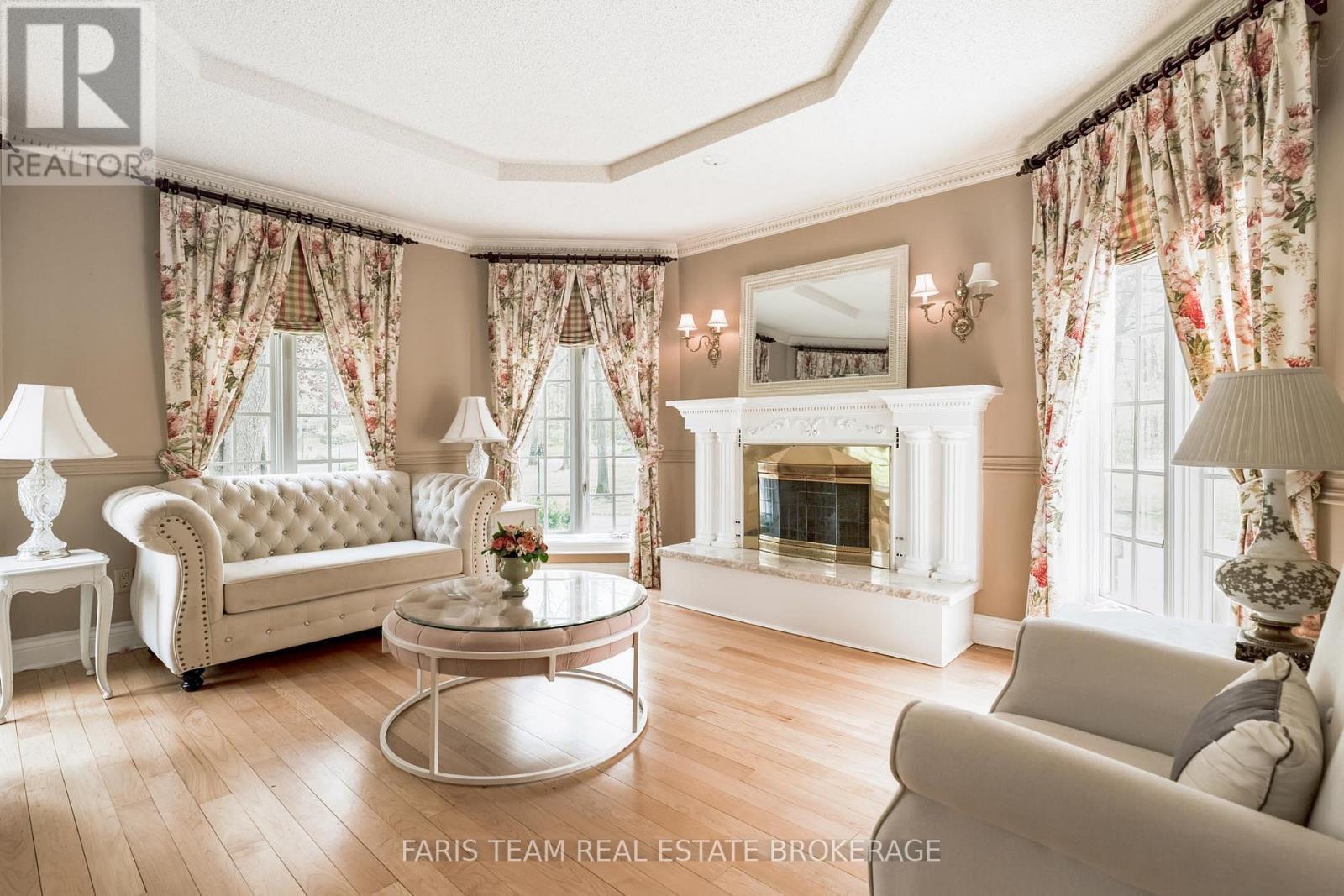 4 Mills Circle, Springwater, ON - Indoor Photo Showing Living Room With Fireplace