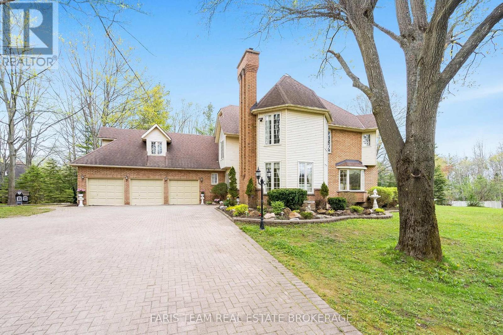 4 Mills Circle, Springwater, ON - Outdoor With Facade